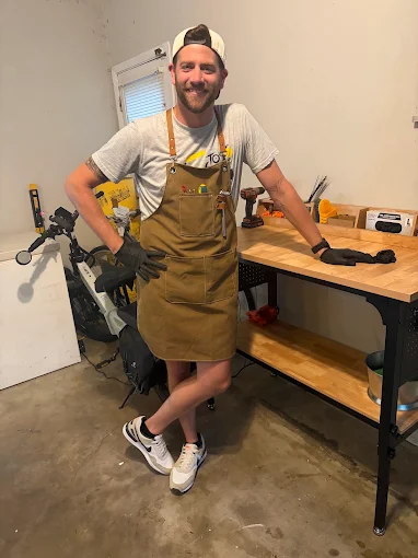 Levi, owner and mechanic at Bluff Road Bike Co, in the shop